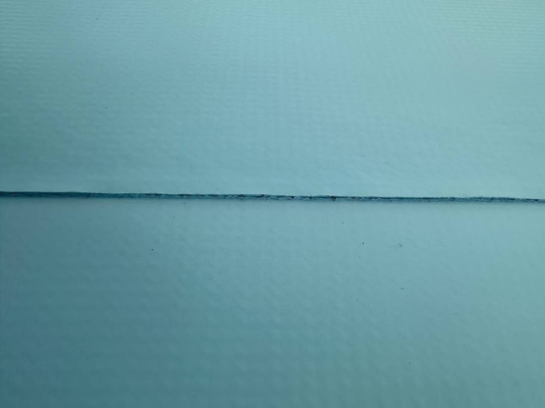 Light blue membrane with a welded seam