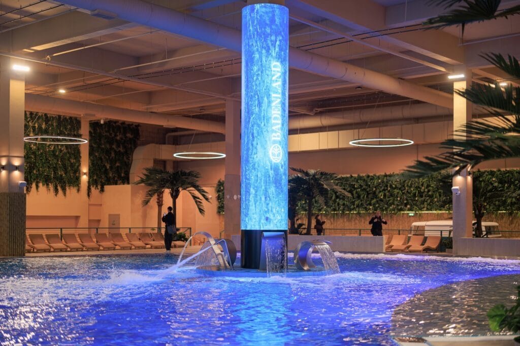 Inside the 1,200 square metre recreational pool, a lit water column rising from it